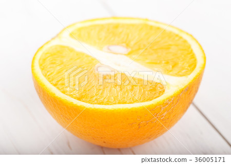 half of orange on a white background half of orange on a white background 36005171