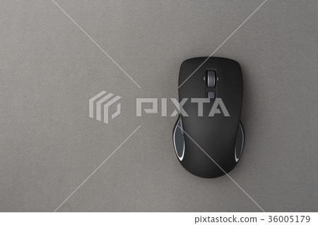 wireless computer mouse on a gray background wireless computer mouse on a gray background 36005179