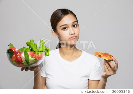 Woman with salad and pizza Woman with salad and pizza 36005346
