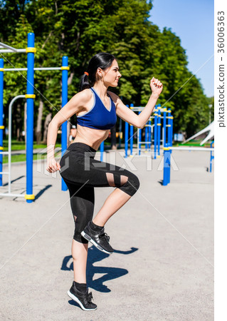 healthy woman making exercises 36006363