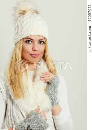Woman wearing warm winter clothing 36007051
