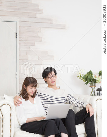 Men and women relaxing on the couch Men and women relaxing on the couch 36008932