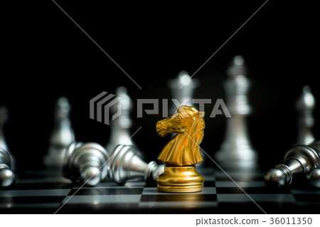 Gold horse in chess game face with the silver team Gold horse in chess game face with the silver team 36011350