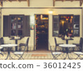 Blurred image of an outdoor cafe. Retro effect.   36012425