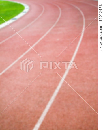 Blurred image of athletics running track. Blurred image of athletics running track. 36012428