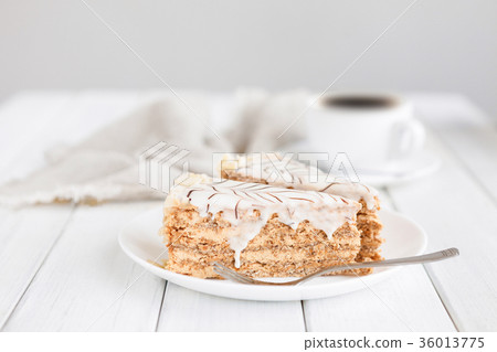 Esterhazy cake sliced on white plate close-up 36013775