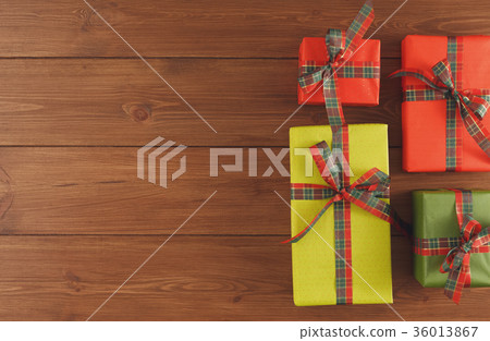 Christmas gift boxes, top view on wood table 36013867