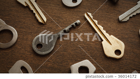 Many different keys on wood 36014172