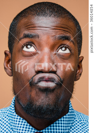 Positive thinking African-American man on brown 36014854
