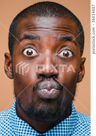 Positive thinking African-American man on brown 36014887