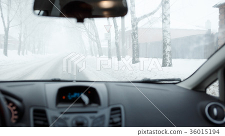 Bad weather driving in winter. Fog on the road Bad weather driving in winter. Fog on the road 36015194