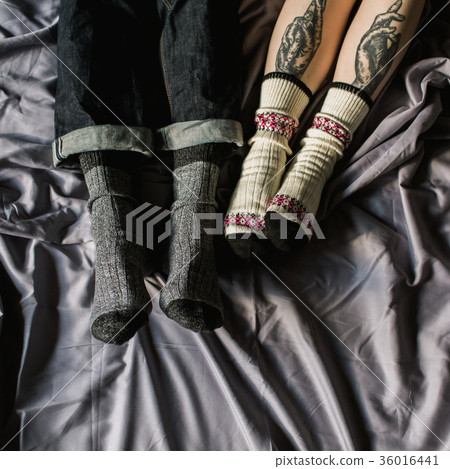 Feet in woollen. Pair relax with a cup of hot Feet in woollen. Pair relax with a cup of hot 36016441