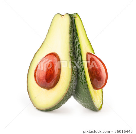 Two avocados with oily stones isolated Two avocados with oily stones isolated 36016443