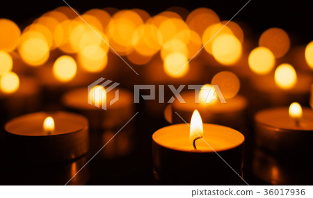 Burning candles with shallow depth of field Burning candles with shallow depth of field 36017936