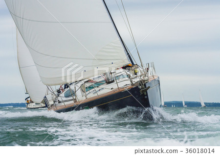 Two Sailing Boat Yachts Racing at Sea Two Sailing Boat Yachts Racing at Sea 36018014