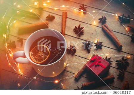Cup of tea with Christmas ingredients and gift box Cup of tea with Christmas ingredients and gift box 36018317