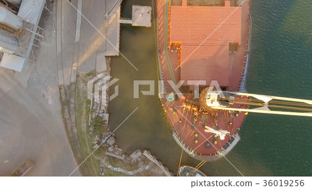 Aerial view of big grain elevators on the sea Aerial view of big grain elevators on the sea 36019256