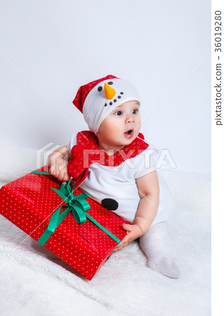 happy baby in snowman costume with christmas happy baby in snowman costume with christmas 36019280