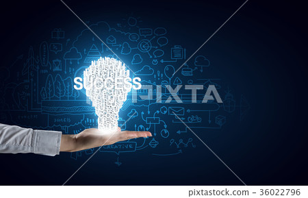 Light bulb in hand Light bulb in hand 36022796