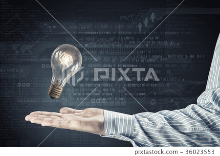 Light bulb in hand 36023553