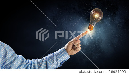 Light bulb in hand 36023693