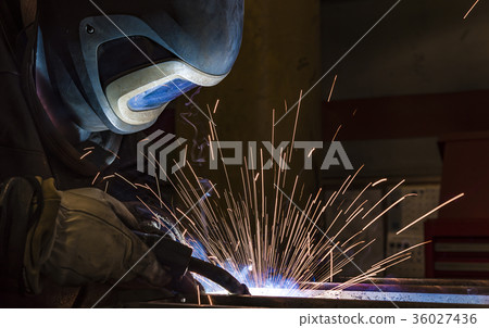 Industrial steel welder in factory Industrial steel welder in factory 36027436
