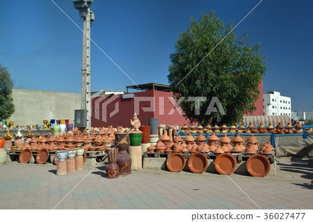 Tagine pots line the roadside in Morocco 36027477