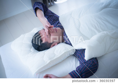 Waking up young man lack of sleep 36030397