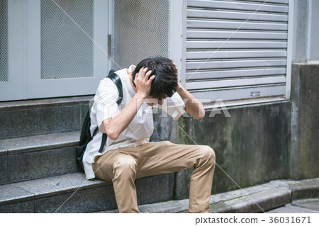 Man holding his head Man holding his head 36031671