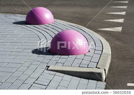 Pink obstacles on the pavement 36032038