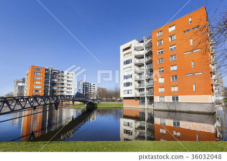 Apartment buildings and water Apartment buildings and water 36032048
