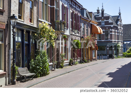 Vintage street with roses Vintage street with roses 36032052