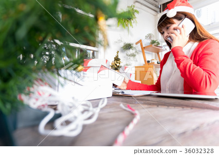 woman wearsanta hat check order online business woman wearsanta hat check order online business 36032328