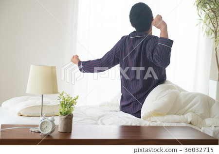Young man getting up Young man getting up 36032715