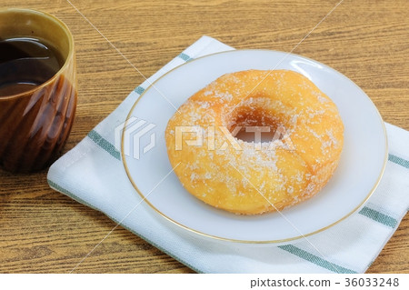 Glazed Donut with Sugar Served with Tea Glazed Donut with Sugar Served with Tea 36033248