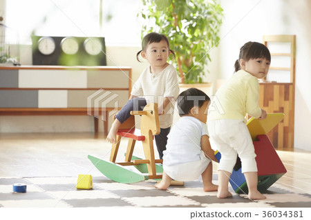 Children playing indoors 36034381