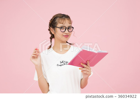 A woman watching a notebook A woman watching a notebook 36034922
