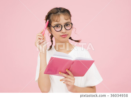 A woman watching a notebook A woman watching a notebook 36034938