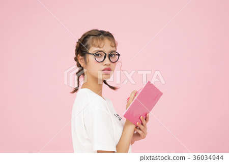 A woman watching a notebook A woman watching a notebook 36034944