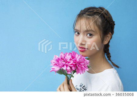 A woman with flowers A woman with flowers 36035008