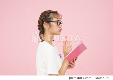 A woman watching a notebook A woman watching a notebook 36035060