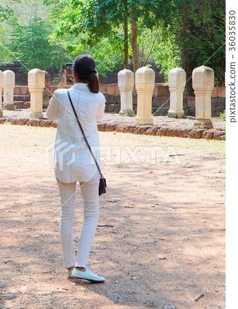 Woman Travelism Taking Photo At Historical Park Woman Travelism Taking Photo At Historical Park 36035830