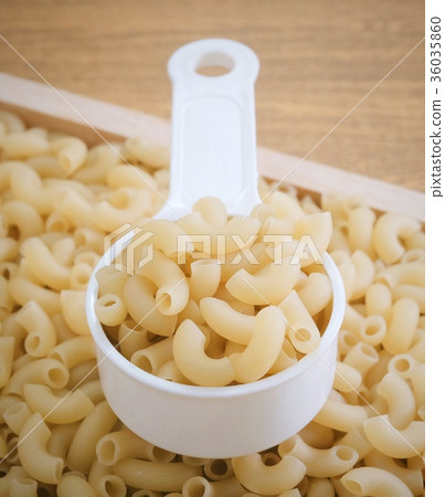 Elbow Macaroni or Gomiti Pasta in Measuring Cup 36035860