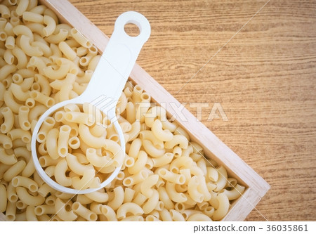 Elbow Macaroni or Gomiti Pasta in Measuring Cup 36035861