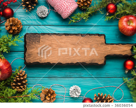 Christmas green background with wooden board 36036054