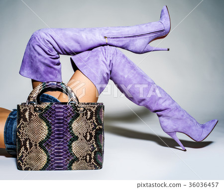 women legs in fashionable batford high heels. 36036457