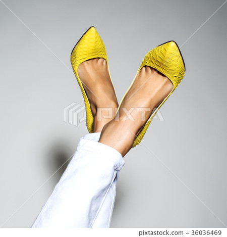 women legs in beautiful fashionable high heels women legs in beautiful fashionable high heels 36036469
