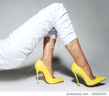 women legs in beautiful fashionable high heels women legs in beautiful fashionable high heels 36036476