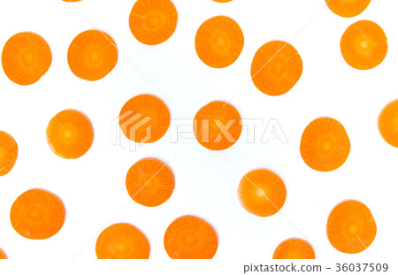Carrot slices on white background flat lay Carrot slices on white background flat lay 36037509