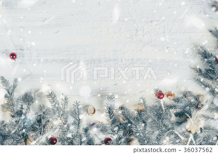 Background with Christmas tree decorated branches Background with Christmas tree decorated branches 36037562